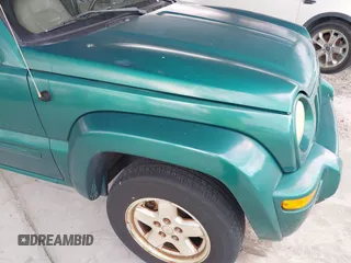 2004 Jeep Liberty Limited with VIN 1J4GK58K94W104382, listed as a IAAI auction lot 40214679 with 143,836 mi miles. Bid and sale history available at carsss.com. Image 12.