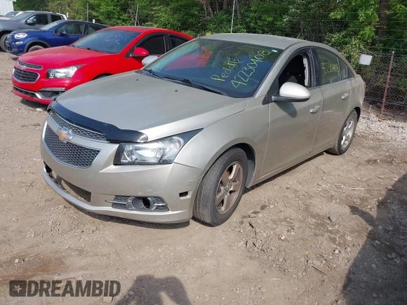 2014 Chevrolet Cruze 1LT with VIN 1G1PC5SB9E7180989, listed as a IAAI auction lot 42230408 with 112,927 mi miles and . Bid and sale history available at DreamBid. Image 2.