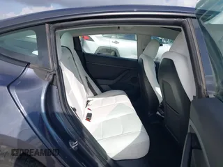 2023 Tesla Model 3 with VIN 5YJ3E1EA7PF567906, listed as a IAAI auction lot 42280993 with 41,452 mi miles and . Bid and sale history available at DreamBid. Image 8.