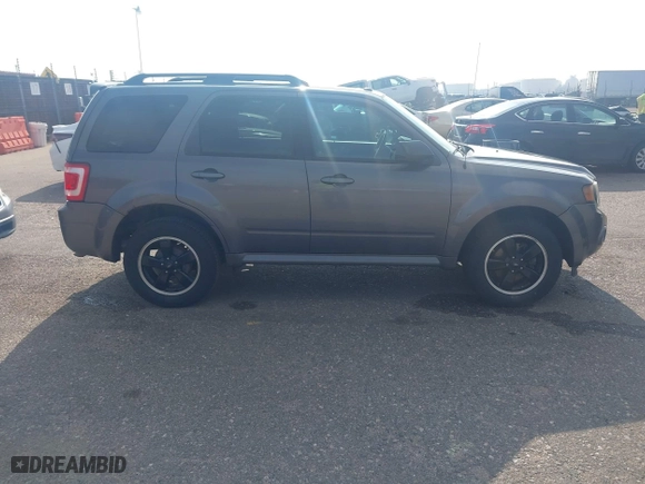 2011 Ford Escape XLT with VIN 1FMCU9D78BKC39019, listed as a IAAI auction lot 41903813 with 226,401 mi miles. Bid and sale history available at carsss.com. Image 13.
