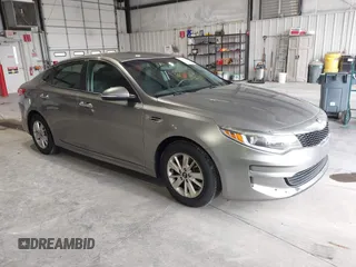 2016 Kia Optima LX with VIN 5XXGT4L33GG026183, listed as a IAAI auction lot 42156799 with 163,000 mi miles and . Bid and sale history available at carsss.com. Image 1.