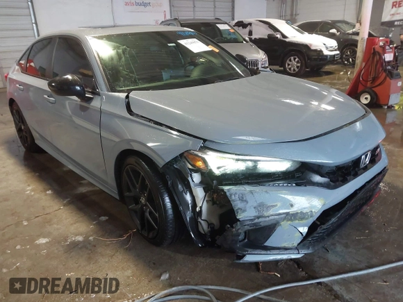 2022 Honda Civic Si with VIN 2HGFE1E59NH472028, listed as a IAAI auction lot 41249075 with 37,970 mi miles and . Bid and sale history available at DreamBid. Image 1.