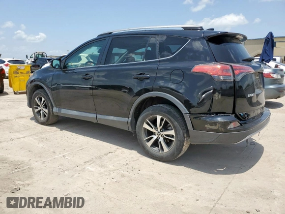 2018 Toyota RAV4 XLE with VIN 2T3WFREV2JW433186, listed as a Copart auction lot 61008705 with 57,310 mi miles and Salvage title. Bid and sale history available at DreamBid. Image 2.