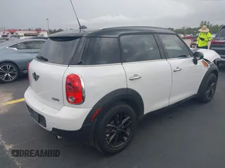 2012 MINI Countryman z VIN WMWZB3C56CWM04087, wystawiony jako IAAI lot #42180040 z przebiegiem 37 789 mil mil oraz . Historia ofert i sprzedaży dostępna na DreamBid. Obrazek 4.