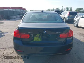 2014 BMW 3 Series 328i xDrive with VIN WBA3B5G56ENS06890, listed as a IAAI auction lot 42168982 with 133,664 mi miles. Bid and sale history available at carsss.com. Image 16.