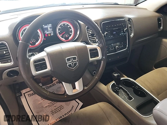 2013 Dodge Durango SXT with VIN 1C4RDJAG8DC671689, listed as a IAAI auction lot 42743958 with 160,950 mi miles and . Bid and sale history available at DreamBid. Image 24.