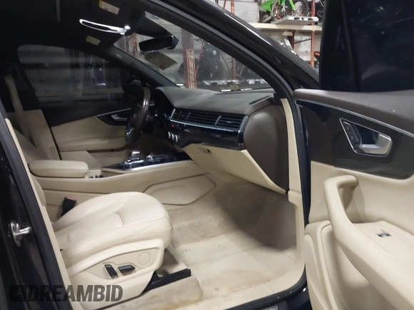 2017 Audi Q7 Premium Plus z VIN WA1LAAF78HD026784, wystawiony jako IAAI lot #41674278 z przebiegiem 108 036 mil mil oraz . Historia ofert i sprzedaży dostępna na DreamBid. Obrazek 5.