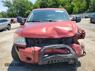 2015 Nissan Titan Pro-4X with VIN 1N6BA0EC5FN506358, listed as a Copart auction lot 56671205 with 153,712 mi miles and Salvage title. Bid and sale history available at DreamBid. Image 5.