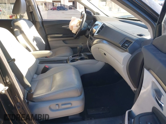 2018 Honda Pilot EX-L with VIN 5FNYF5H58JB013113, listed as a IAAI auction lot 41313206 with 125,825 mi miles. Bid and sale history available at carsss.com. Image 5.