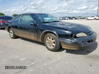 1995 Ford Thunderbird LX z VIN 1FALP62W7SH175725, wystawiony jako Copart lot #60622085 z przebiegiem 77 454 mil mil oraz Czysty tytuł • Clean title. Historia ofert i sprzedaży dostępna na DreamBid. Obrazek 4.