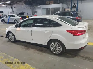2017 Ford Focus Titanium with VIN 1FADP3J25HL213184, listed as a Copart auction lot 61653155 with 120,883 mi miles and Clean title. Bid and sale history available at DreamBid. Image 2.
