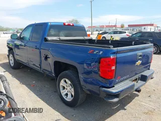 2018 Chevrolet Silverado 1500 LT with VIN 1GCVKREC9JZ123333, listed as a IAAI auction lot 42070916 with 142,814 mi miles and . Bid and sale history available at DreamBid. Image 3.