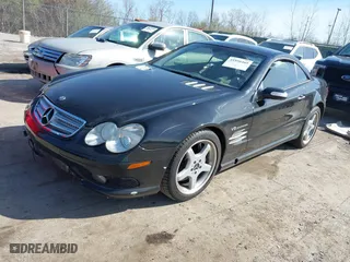 2005 Mercedes-Benz SL-Class 5.5L AMG with VIN WDBSK74F35F103586, listed as a IAAI auction lot 41958469 with 1 mi miles. Bid and sale history available at carsss.com. Image 2.