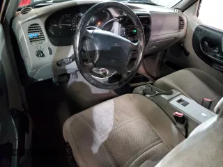 2000 Ford Ranger XL with VIN 1FTZR15V8YTA83226, listed as a Copart auction lot 51004555 with 218,083 mi miles and Salvage title. Bid and sale history available at DreamBid. Image 8.