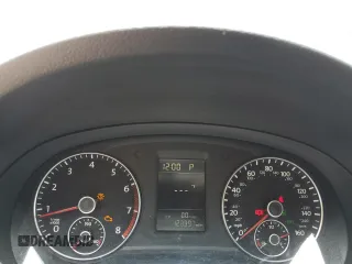 2014 Volkswagen Passat S z VIN 1VWAT7A30EC078066, wystawiony jako Copart lot #58312015 z przebiegiem 123 397 mil mil oraz Szkoda całkowita • Salvage title. Historia ofert i sprzedaży dostępna na DreamBid. Obrazek 9.