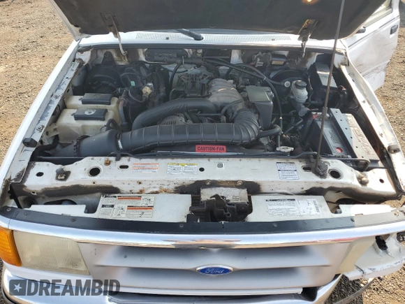 1995 Ford Ranger Splash z VIN 1FTCR14U4SPB12641, wystawiony jako Copart lot #51547255 z przebiegiem 106 647 mil mil oraz Szkoda całkowita • Salvage title. Historia ofert i sprzedaży dostępna na DreamBid. Obrazek 12.