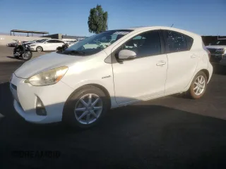 2012 Toyota Prius One z VIN JTDKDTB3XC1013150, wystawiony jako Copart lot #60515315 z przebiegiem 168 042 mil mil oraz Czysty tytuł • Clean title. Historia ofert i sprzedaży dostępna na DreamBid. Obrazek 1.