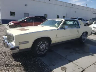 1984 Cadillac Eldorado z VIN 1G6AL578XEE621800, wystawiony jako Copart lot #72058714 z przebiegiem 50 757 mil mil oraz Tytuł czysty. Historia ofert i sprzedaży dostępna na DreamBid. Obrazek 1.