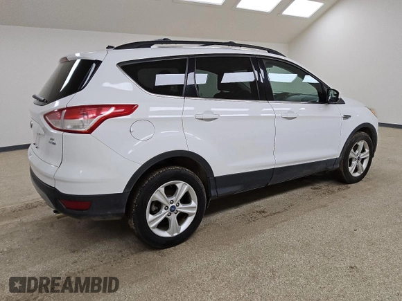 2014 Ford Escape SE с VIN 1FMCU9G93EUE26268, выставлен на аукционе Copart как лот 62872595 с пробегом 174 112 миль миль и Чистый • Clean title. История ставок и продаж доступна на DreamBid. Изображение 3.