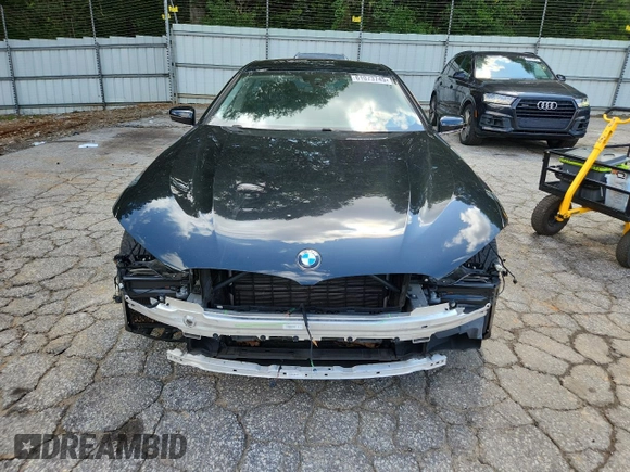 2020 BMW 8 Series 840i with VIN WBAGV2C02LCE04556, listed as a Copart auction lot 61073745 with 60,651 mi miles and Salvage title. Bid and sale history available at DreamBid. Image 5.