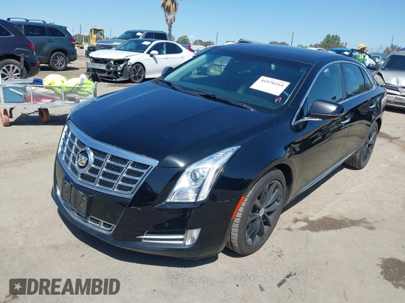 2013 Cadillac XTS Luxury z VIN 2G61P5S30D9220113, wystawiony jako IAAI lot #41970214 z przebiegiem 52 476 mil mil oraz . Historia ofert i sprzedaży dostępna na DreamBid. Obrazek 17.