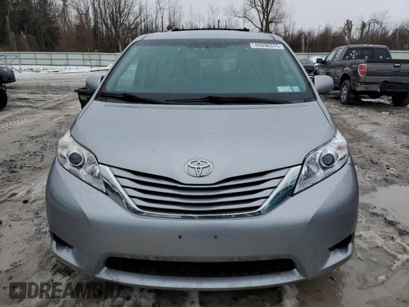 2017 Toyota Sienna LE with VIN 5TDJZ3DC5HS173988, listed as a Copart auction lot 46996375 with 67,971 mi miles and Salvage Title. Bid and sale history available at carsss.com. Image 5.