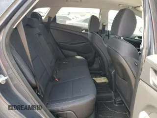 2019 Hyundai Tucson Value z VIN KM8J33A40KU914285, wystawiony jako Copart lot #54839375 z przebiegiem 81 214 mil mil oraz Szkoda całkowita • Salvage title. Historia ofert i sprzedaży dostępna na DreamBid. Obrazek 11.