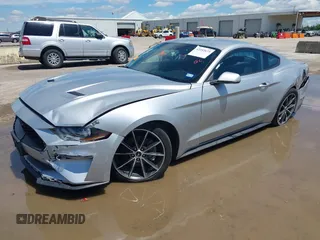 2018 Ford Mustang EcoBoost with VIN 1FA6P8THXJ5128830, listed as a IAAI auction lot 42192673 with 58,817 mi miles and . Bid and sale history available at DreamBid. Image 18.