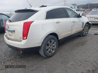 2014 Cadillac SRX Luxury Collection with VIN 3GYFNEE32ES671966, listed as a IAAI auction lot 41863732 with 122,258 mi miles. Bid and sale history available at carsss.com. Image 4.