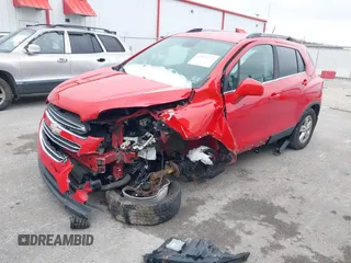 2016 Chevrolet Trax LT with VIN KL7CJPSB6GB606268, listed as a IAAI auction lot 41571773 with 141,906 mi miles and . Bid and sale history available at DreamBid. Image 2.