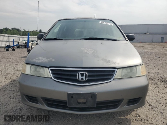 2002 Honda Odyssey LX z VIN 2HKRL18572H531397, wystawiony jako Copart lot #54533535 z przebiegiem 241 052 mil mil oraz Czysty tytuł • Clean title. Historia ofert i sprzedaży dostępna na DreamBid. Obrazek 5.