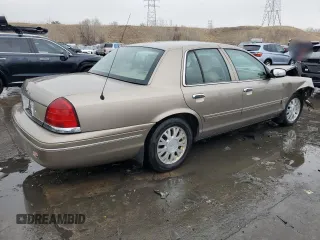 2005 Ford Crown Victoria LX z VIN 2FAFP74W05X122403, wystawiony jako Copart lot #45305825 z przebiegiem 202 381 mil mil oraz Szkoda całkowita • Salvage title. Historia ofert i sprzedaży dostępna na DreamBid. Obrazek 3.