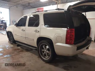 2009 GMC Yukon SLT w/4SB with VIN 1GKFC33069R299683, listed as a IAAI auction lot 41453259 with 182,415 mi miles. Bid and sale history available at carsss.com. Image 3.