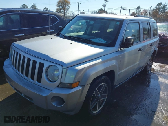 2008 Jeep Patriot Sport with VIN 1J8FT28W38D798125, listed as a IAAI auction lot 41004403 with 98,841 mi miles. Bid and sale history available at carsss.com. Image 2.