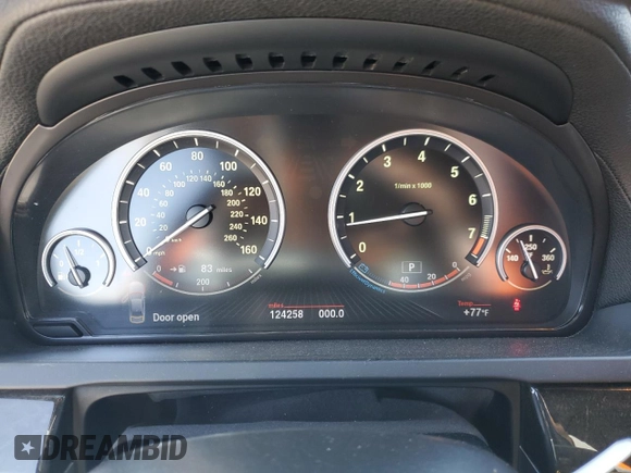 2013 BMW 7 Series 750i with VIN WBAYA8C54DC996412, listed as a Copart auction lot 56982895 with 124,258 mi miles and Salvage title. Bid and sale history available at DreamBid. Image 9.