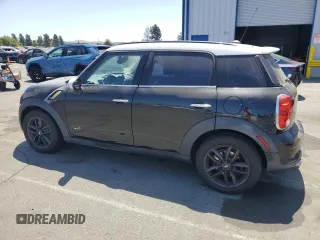 2013 MINI Countryman S ALL4 with VIN WMWZC5C52DWP30625, listed as a Copart auction lot 62772395 with 129,498 mi miles and Salvage title. Bid and sale history available at DreamBid. Image 2.