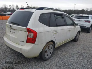 2009 Kia Rondo LX with VIN KNAFG526097252515, listed as a IAAI auction lot 41391949 with 174,583 mi miles. Bid and sale history available at carsss.com. Image 4.
