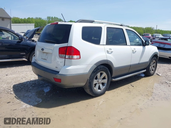 2009 Kia Borrego EX with VIN KNDJH741995016237, listed as a IAAI auction lot 42140573 with 161,269 mi miles. Bid and sale history available at carsss.com. Image 4.