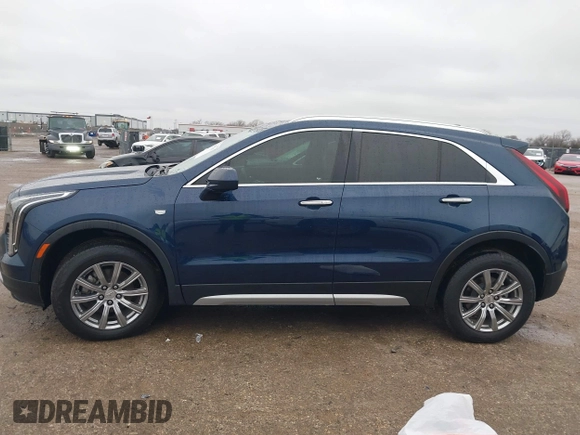 2019 Cadillac XT4 FWD Premium Luxury with VIN 1GYFZCR46KF171126, listed as a IAAI auction lot 41557387 with 88,811 mi miles. Bid and sale history available at carsss.com. Image 15.
