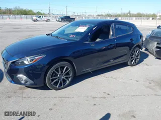 2014 Mazda Mazda3 s Grand Touring with VIN JM1BM1M32E1208762, listed as a IAAI auction lot 41814130 with 117,620 mi miles. Bid and sale history available at carsss.com. Image 2.