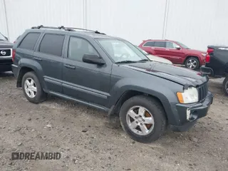 2007 Jeep Grand Cherokee Laredo with VIN 1J8HR48P07C523263, listed as a IAAI auction lot 41852768 with 275,009 mi miles. Bid and sale history available at carsss.com. Image 1.