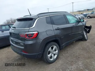 2018 Jeep Compass Latitude with VIN 3C4NJDBB8JT307154, listed as a IAAI auction lot 42056744 with 94,454 mi miles and . Bid and sale history available at DreamBid. Image 4.