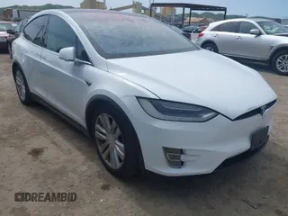 2016 Tesla Model X 70D with VIN 5YJXCBE24GF002020, listed as a IAAI auction lot 41799528 with 149,556 mi miles. Bid and sale history available at carsss.com. Image 1.
