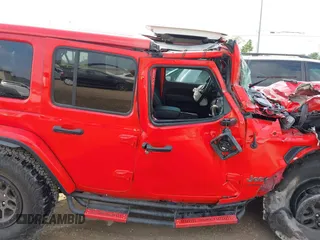 2021 Jeep Wrangler Unlimited Rubicon 392 z VIN 1C4JJXSJ0MW827483, wystawiony jako IAAI lot #42060337 z przebiegiem 34 625 mil mil oraz . Historia ofert i sprzedaży dostępna na DreamBid. Obrazek 13.