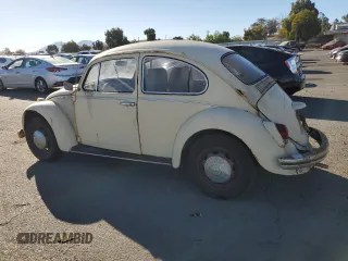 1969 Volkswagen Beetle with VIN 1190494912, listed as a Copart auction lot 75495264 with 67,827 mi miles and Salvage Title. Bid and sale history available at DreamBid. Image 2.