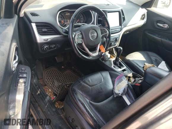 2014 Jeep Cherokee Trailhawk with VIN 1C4PJMBS1EW304718, listed as a Copart auction lot 64105485 with 151,315 mi miles and Salvage title. Bid and sale history available at DreamBid. Image 8.
