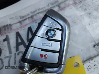 2018 BMW 5 Series M550i xDrive with VIN WBAJB9C59JG463948, listed as a IAAI auction lot 41845989 with 99,385 mi miles. Bid and sale history available at carsss.com. Image 11.