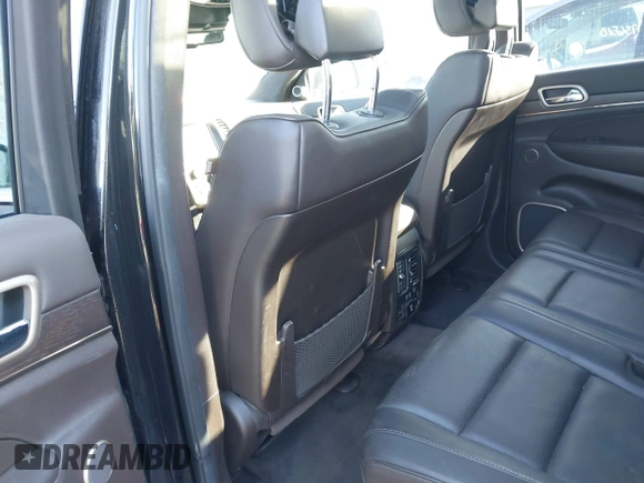 2014 Jeep Grand Cherokee Summit с VIN 1C4RJFJGXEC528136, выставлен на аукционе IAAI как лот 41707972 с пробегом 131 402 миль миль и . История ставок и продаж доступна на DreamBid. Изображение 8.