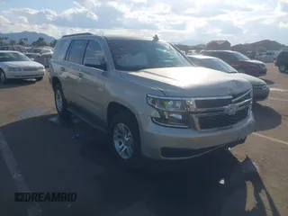 2015 Chevrolet Tahoe LS with VIN 1GNSCAKC7FR717469, listed as a IAAI auction lot 41459843 with 219,300 mi miles and . Bid and sale history available at DreamBid. Image 1.