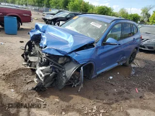 2017 BMW X1 xDrive28i with VIN WBXHT3C32H5F81460, listed as a Copart auction lot 55998515 with 123,853 mi miles and Salvage title. Bid and sale history available at DreamBid. Image 1.